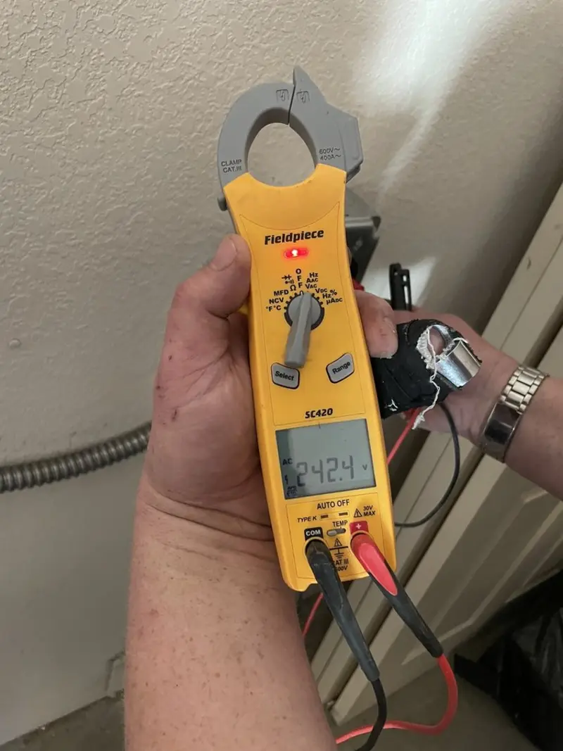 Voltage testing with clamp meter during Aluminum Wiring Replacement in Louisville